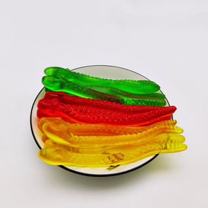 Usine de bonbons halal en vrac Mélange de gelée Collations sucrées Casher Bonbons colorés avec de drôles de fruits Emballage en bouteille de bonbons gommeux aromatisés - Product Image 1