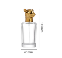 Flacon pulvérisateur de parfum vide en verre cylindrique 50 ml, qualité supérieure OEM ODM, avec capuchon tête d'animal et base lourde, pour échantillons de parfum, prix compétitif