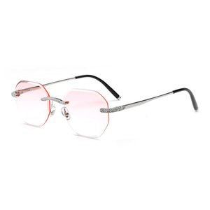 Gafas de Metal Doradas sin Montura para Mujer, Ligeras, Elegantes, con Lentes Geométricas y Detalle de Diamantes de Imitación - Product Image 1