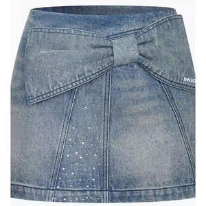 Mini-jupe en jean 3D vintage de haute qualité pour femme, avec boutons, coupe droite, technique délavée, taille unie, idéale pour l'été – Vente en gros - Product Image 3