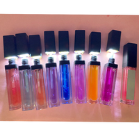 Huile Repulpante pour Lèvres à Lumière LED en Gros, Végétalienne, Tube de Gloss à Lèvres LED avec Miroir et Logo Personnalisé, Huile Gloss Pailletée