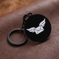 Porte-clés Souvenir Personnalisé en Métal Noir Mat en Alliage de Zinc avec Logo Enveloppe Volante 3D Incrusté et Émail pour Usage Quotidien et Cadeaux
