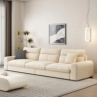 Canapé sectionnel en tissu crème au design moderne et épuré, avec technologie Wind, convertible et capitonné, pour hôtel, villa, salon, hall