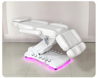 Table de massage électrique de luxe à 3/4 moteurs pour salon de beauté et spa, avec lumière d'ambiance et commande au pied
