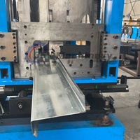 Machine de formage à froid entièrement automatique à haute efficacité et haute vitesse pour la production de poutrelles en acier en forme de Z