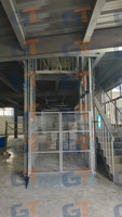 Ascenseur de fret à rail industriel, durable et stable pour le levage de marchandises lourdes en entrepôt