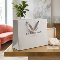 Sac shopping en papier de marque avec poignées en corde de coton, design personnalisé pour l'emballage de vêtements, solution de sac cadeau de luxe recyclable