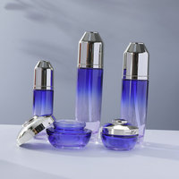 Petit coffret de soins Jiao noir avec flacon en verre et pulvérisateur à pompe sérigraphié pour crème visage et contour des yeux – Emballage cosmétique