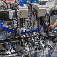 Machine d'assemblage de pompes à lotion NBTY, équipement de pressage de bouchons en plastique contrôlé par PLC, test de tenue, emballage cosmétique, garantie 1 an