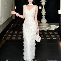 Robe longue personnalisée pour femme à franges et pompons, sans manches, col en V, à volants, texture élégante, pour soirée, OEM ODM, marque privée, vente en gros de vêtements