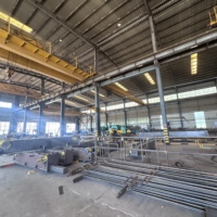 Grúa Puente Electromagnética Wanlong Tipo QC de 5-20 Toneladas, Sistema Motorizado Controlado por PLC, Vano de 19.5M, 18m para Construcción de Talleres