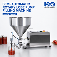 Machine de remplissage semi-automatique à lobes rotatifs à empreinte compacte pour pâtes, sauces et miels à haute viscosité