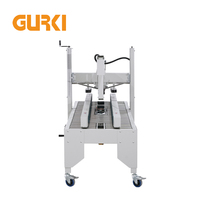 Machine de scellage automatique de boîtes à ruban adhésif électrique GURKI pour l'emballage de boissons et de vêtements