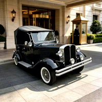 Voiture électrique classique noire exquise, style rétro, avec capote noire, véhicule électrique de tourisme, directement de l'usine