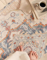 A Vintage Persian Carpet Featuring a Floral Design, Ideal for a Country-style Living Room.
