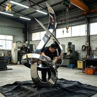 Sculpture abstraite élégante en acier inoxydable poli RELONG, art métallique contemporain pour l'extérieur
