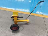 Chariot de transport robuste en fer thermolaqué jaune avec plateau en verre et 2 roues pour la manutention et le traitement des feuilles de verre