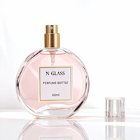 Flacon de parfum vide personnalisé de haute qualité 30ml 50ml 100ml Boîte ronde en verre transparent avec pulvérisateur à pompe de luxe Impression d'écran