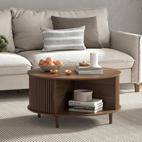 Table basse ronde en noyer avec rangement dissimulé et étagère inférieure, design côtelé moderne, idéale pour l'organisation du salon