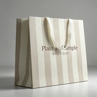 Individuelle Logo-Papiertragetasche für Kosmetik und Kleidung Umweltfreundliche Luxus-Geschenkverpackung mit Griff