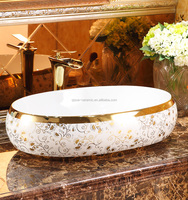 Comptoir de luxe WC Vanité en céramique dorée Lavabo de salle de bain au-dessus du montage Installation Couleur or Lavabo à main