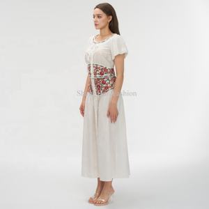 ผู้ผลิต OEM รับออกแบบกระโปรงยาวผ้าฝ้ายสำหรับผู้หญิง กระโปรงแม็กซี่ปักลายดอกไม้ติดกระดุม - Product Image 2