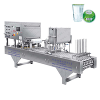 Machine de remplissage et de scellage de gobelets d'eau minérale