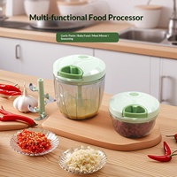 Huishoudelijke multifunctionele knoflookpers en -pureeknijper met nylon touw voor groene ui, aardappelpuree, pompoenpuree en babyvoeding.