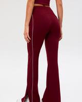 Pantalon large taille haute en nylon et élasthanne avec empiècements latéraux contrastants, idéal pour le sport et le style décontracté automne-hiver