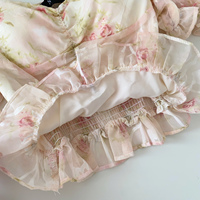 Chemisier élégant d'été pour femme à manches courtes bouffantes, col cœur, ourlet froncé et volanté, avec ceinture à nouer, motif floral