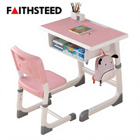 Ensemble bureau et chaise réglables en hauteur pour enfants avec structure métallique incurvée et compartiment de rangement ouvert pour la maison et l'école