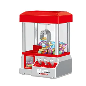 Yenilik oyuncak yetişkinler çocuklar için jetonlu şeker kapmak masaüstü bebek şeker Catcher vinç makinesi oyunu