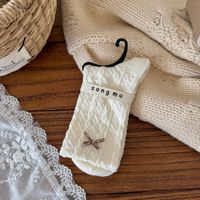 Chaussettes pour femmes préparées pour l'hiver, chaussettes chaudes en tricot à motif à pois pour la vente en gros