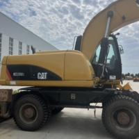 Excavatrice sur pneus CAT M320D d'occasion, 20 tonnes, Caterpillar M320D, à vendre