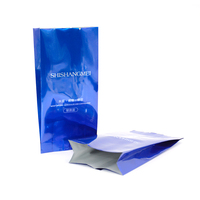 Sachet en plastique brillant bleu avec soufflet latéral et soudure centrale, pochette thermoscellable personnalisée pour emballage cosmétique