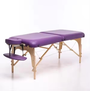 Table de massage portable en bois pliable, vente en gros d'usine, <span class=keywords><strong>pas</strong></span> <span class=keywords><strong>cher</strong></span>, achat de table de massage de beauté - Product Image 1