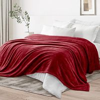 Vente en gros de couverture tricotée en molleton de corail rouge épais et coloré pour l'hiver