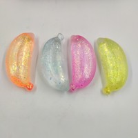 Levify Mignon Pendentif Anti-Stress en TPR Extensible en Forme de Banane Scintillante, Jouet Sensoriel Souple à Presser pour Adultes Unisexe, Fabriqué au Canada