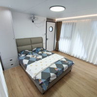 Maison flottante familiale de 11 m au design européen avec salle de bain, 2 chambres, salon et cuisine, climatisation, réfrigérateur, idéale pour les locations Airbnb