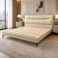 Lit rembourré en cuir véritable et bois massif au design industriel moderne et luxueux, avec cadre en bois massif durable