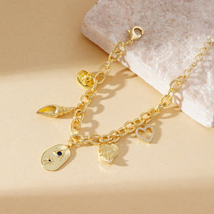 2025 joyería femenina pulsera <span class=keywords><strong>de</strong></span> dijes pequeños pulsera <span class=keywords><strong>de</strong></span> oro <span class=keywords><strong>de</strong></span> 18 quilates con forma <span class=keywords><strong>de</strong></span> corazón <span class=keywords><strong>de</strong></span> amor con hoja <span class=keywords><strong>de</strong></span> clavo <span class=keywords><strong>de</strong></span> mar <span class=keywords><strong>de</strong></span> circón - Product Image 4