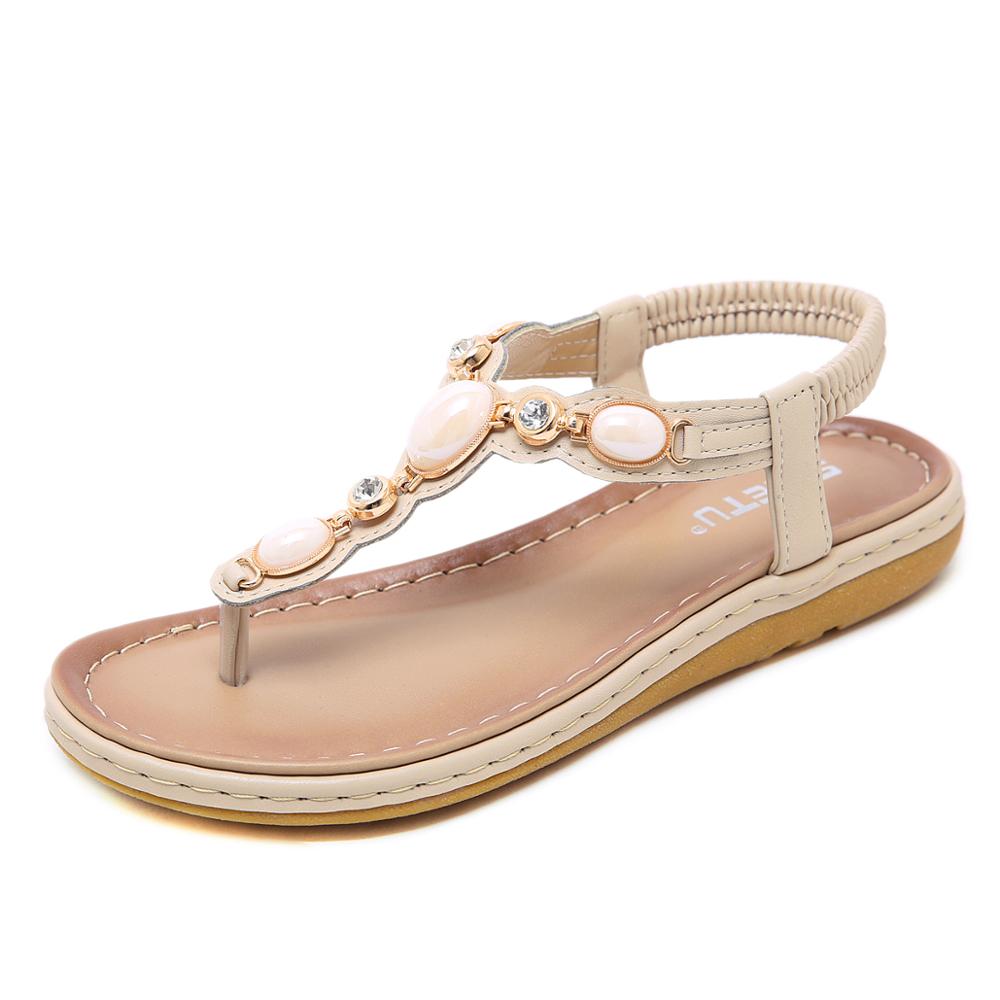 Sandalia de piedras LUNA ANGELINES color ORO para mujer con suela plana