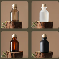 Diffuseur d'arômes élégant en verre 100 ml pour la diffusion de parfums, disponible en plusieurs couleurs, bouteille vide de grande capacité