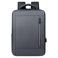 Sac à dos unisexe durable pour étudiant avec port USB, logo personnalisé, en polyester gris, fermeture éclair, imperméable, et dossier ergonomique