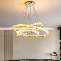 Lustre en cristal moderne de luxe pour la maison Restaurant haut de gamme Anneau de chambre simple Duplex Villa Escalier Lampe Matériau en verre