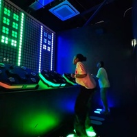 Défis interactifs de salle d'évasion en intérieur pour le team building, avec boutons LED métalliques et jeux Mega Grid, pour aéroports et jardins
