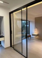 Porte coulissante ultra-étroite en alliage d'aluminium, cadre fin de 16 mm, fonctionnement synchronisé multi-panneaux, cloison intérieure moderne pour villa