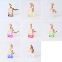 Flacon de parfum en verre coloré transparent fantaisie de 10 ml, vide, plat, diffuseur de voiture suspendu avec bouchon à vis en bois pour huile parfumée
