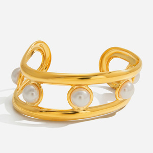 Bracelet manchette tendance doré avec perles d'imitation serties, design linéaire, bijou pour femme, idée cadeau - Product Image 1