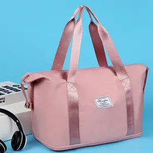 ISO BSCI LVMH çevre dostu toptan özel logo büyük kapasiteli katlanır su geçirmez haftasonu çanta seyahat spor salonu spor pembe silindir çanta